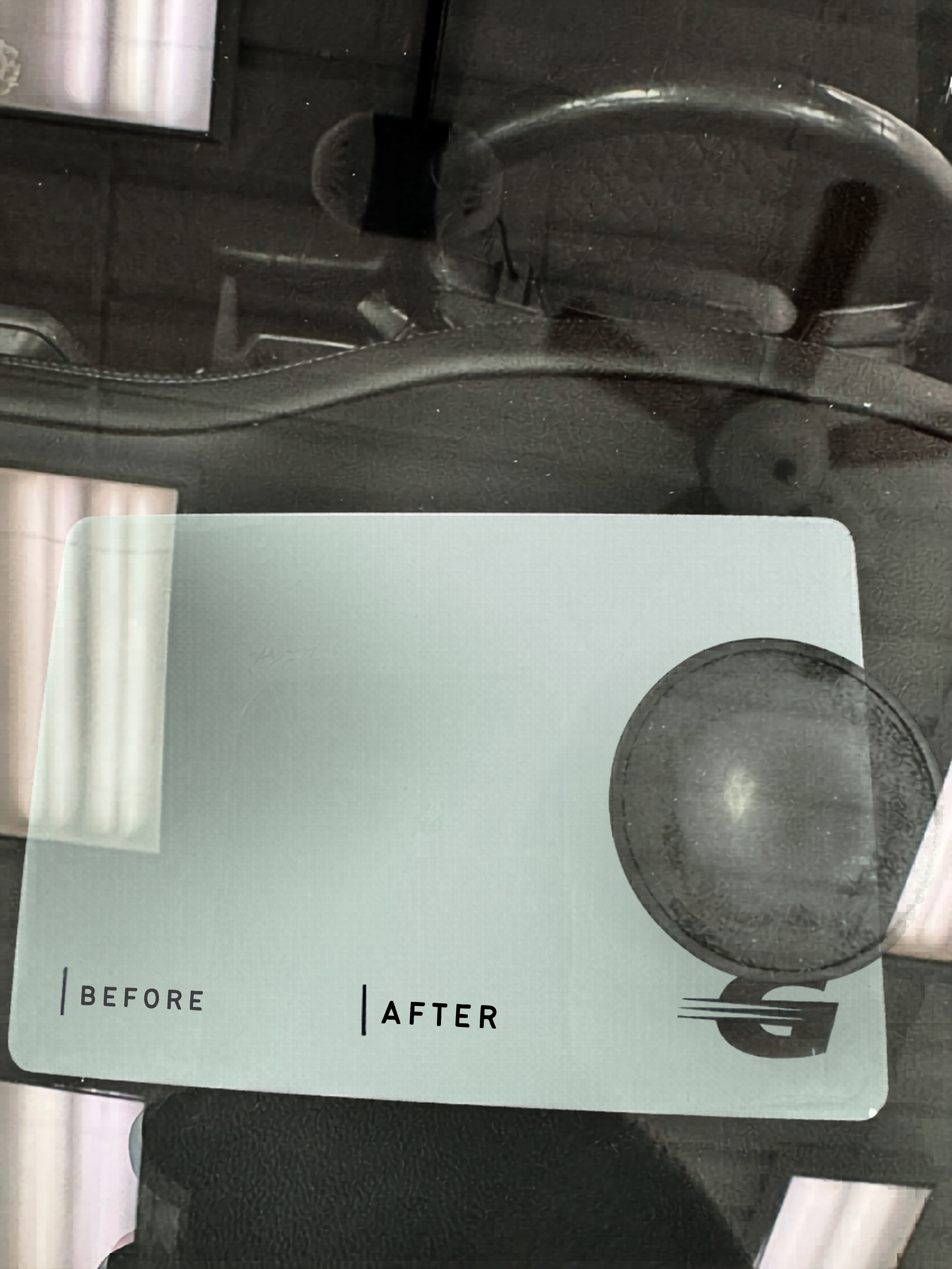 Windshield chip after professional repair — nearly invisible