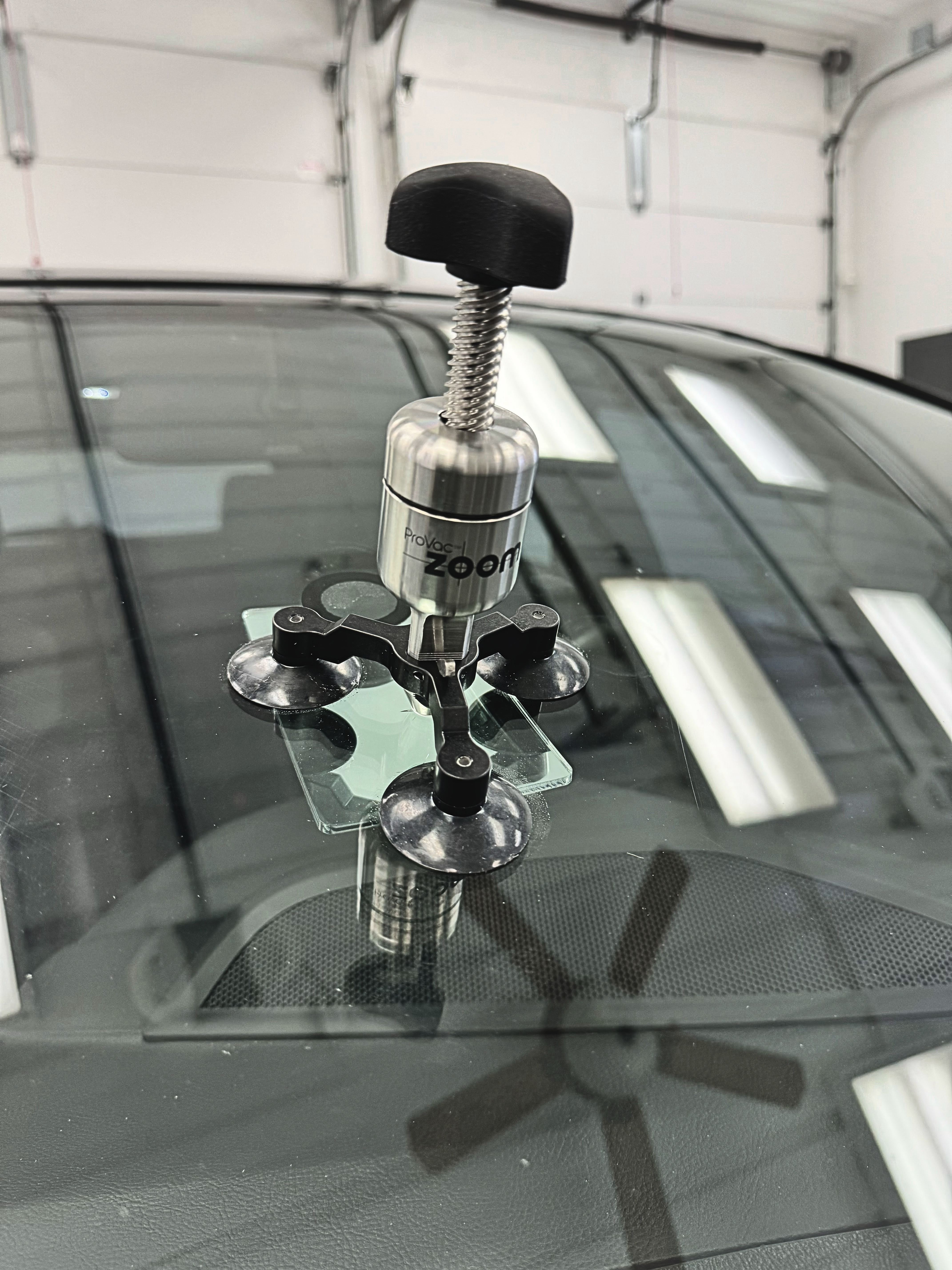 Chip repair injection tool on windshield